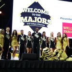 cheerleaders and knightro on stage