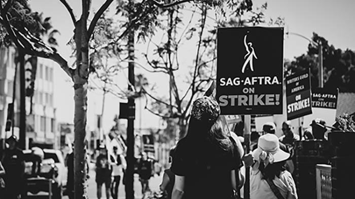 Members of the Hollywood actors union, SAG-AFTRA picket with writers